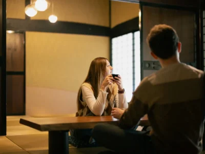 Guest relaxing in a tatami room of Obatake farmhouse Miyama Kyoto