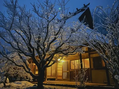 Snowy winter night at a thatched roof house in Miyama Kyoto