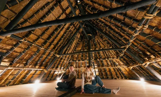 Attic space with exposed wooden beams in Obatake farmhouse Miyama Kyoto