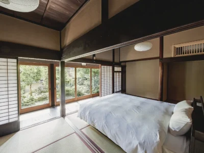 king bed bedroom in Hotaruan thatched house Miyama Kyoto