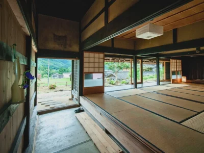Doma entrance and tatami room in a traditional thatched house in Miyama Kyoto
