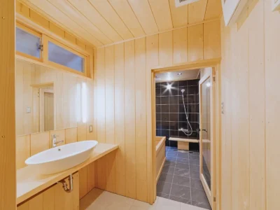 Bathroom and washroom in the Obatake annex with hiba wood interior Miyama Kyoto