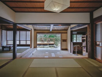 Tatami room and doma interior looking out to nature in EISA thatched house Miyama Kyoto