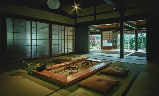 Sunken irori hearth in a Japanese thatched roof farmhouse in Miyama Kyoto