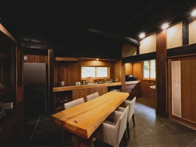 Kitchen and dining area in the main house of Obatake thatched farmhouse Miyama Kyoto