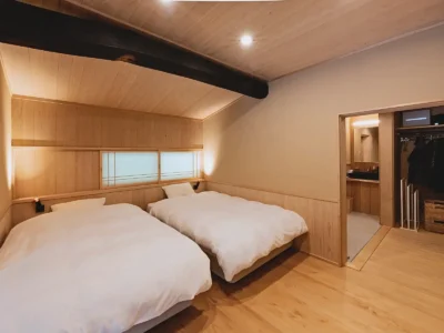Bedroom with beds in the main house of Obatake farmhouse Miyama Kyoto