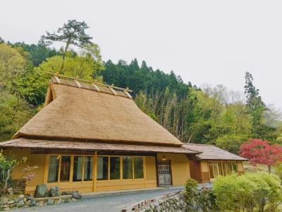 Exterior of Obatake traditional thatched roof house restored in Miyama Kyoto