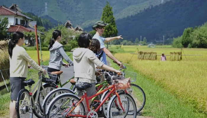 Cycling past rice fields in the countryside of Miyama, Kyoto