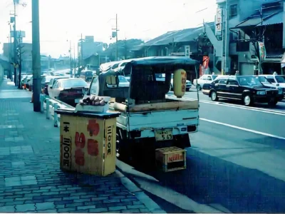 Haruo Nishio selling roasted sweet potatoes in Kyoto in the winter of his early thatching career