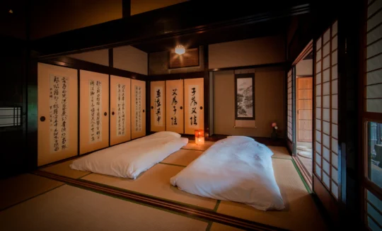 Japanese tatami room prepared with futon in Miyama Kyoto