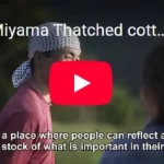 Founder Haruo Nishio speaking about Miyama and thatched-roof culture