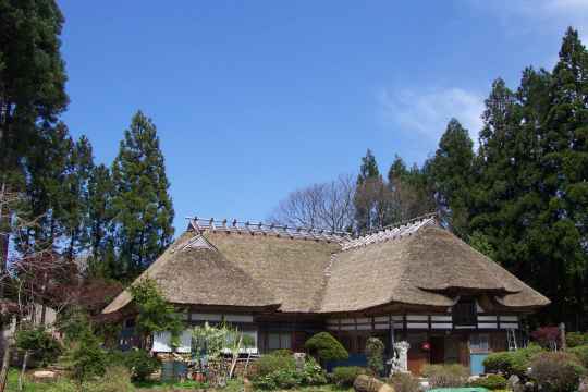 Traditional Japanese thatched-roof house (kayabuki minka)