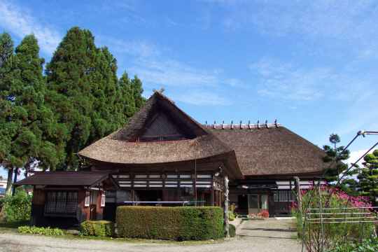 Traditional Japanese thatched-roof house (kayabuki minka)