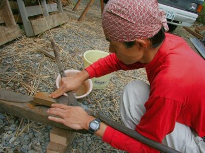 Japanese master thatcher sharpening traditional thatching shears