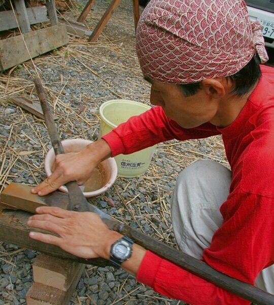 Japanese master thatcher sharpening traditional thatching shears