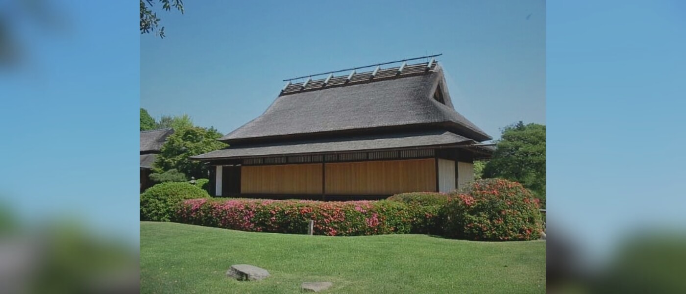 Thatched-roof pavilion in Korakuen Garden, Okayama